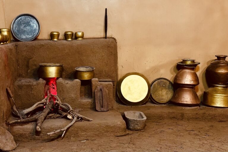 Ancient Medicinal Practices a group of pots sitting on top of a stone floor