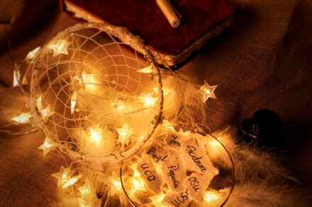 yellow dream catcher with string lights