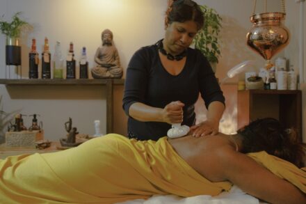 Ayurvedic Healing a person getting the hair done