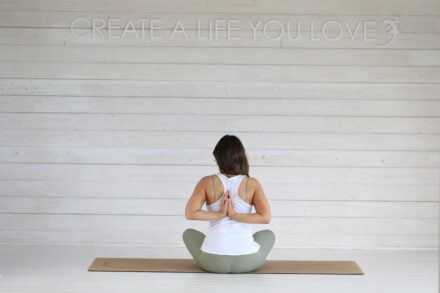 Woman in yoga pose on mat