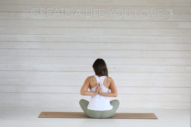 Woman in yoga pose on mat
