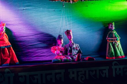 Beginner practicing chakra healing meditation with 7 glowing energy centers