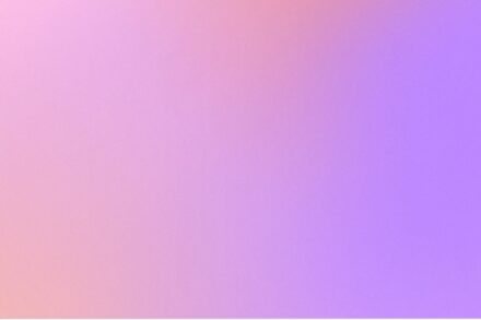 a blurry image of a pink and purple background