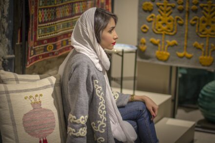 Emotional Healing a woman sitting on a couch in a room