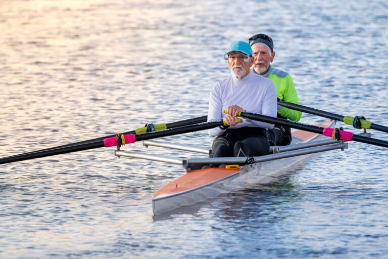 Two people rowing a boat.