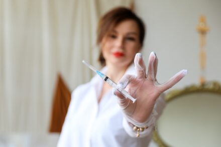 Crystal Healing a woman holding a pen