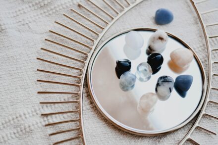 Healing Crystals crystal herbal white and blue marble beads on round white ceramic plate