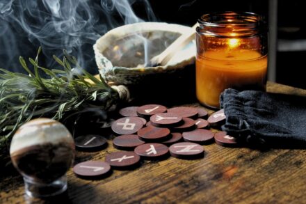 Herbal Integrative Healing Synergy Wellness: 9 Vital Tips for Holistic Health 5 a table with a jar of liquid and a candle on it