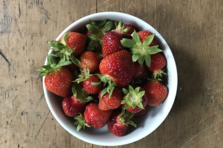 strawberries in white ceramic bowl