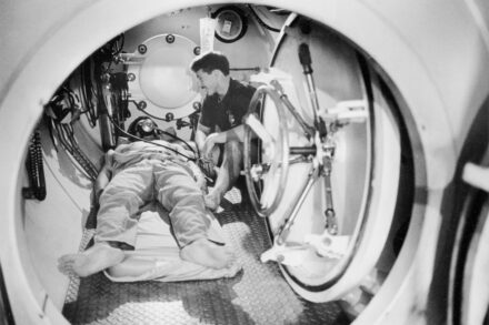 Hyperbaric Chamber Two men inside a decompression chamber