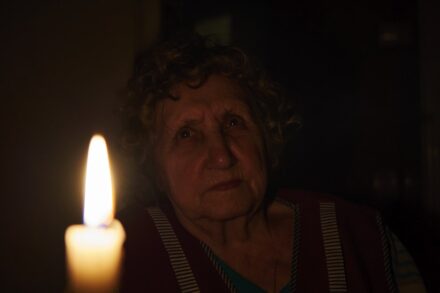 LED Nogier Frequency man in black and white striped shirt