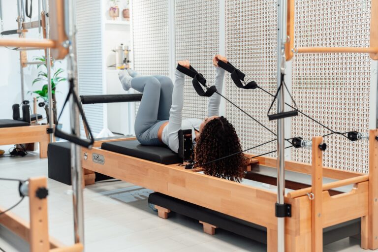 Physical Healing a woman is doing exercises on a rowing machine