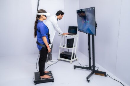 Physical Healing Woman uses vr headset for body scan with technician