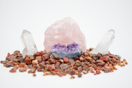 Power Crystals Energy Healing: Ancient Wisdom for Modern Well-Being 3 A pile of rocks and crystals on a white background