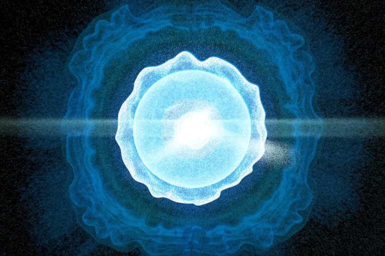 A blue ball of light in the middle of a black background