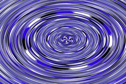 Concentric blue and white circles create a swirling pattern.