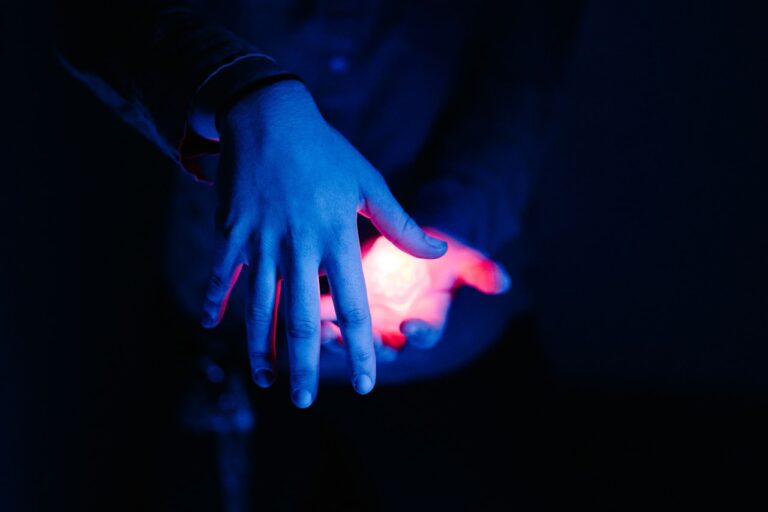 Quantum Healing & Techniques red light on human palm