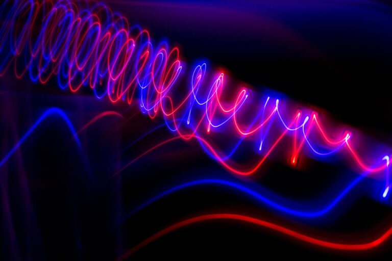 a blurry image of colorful lights in the dark