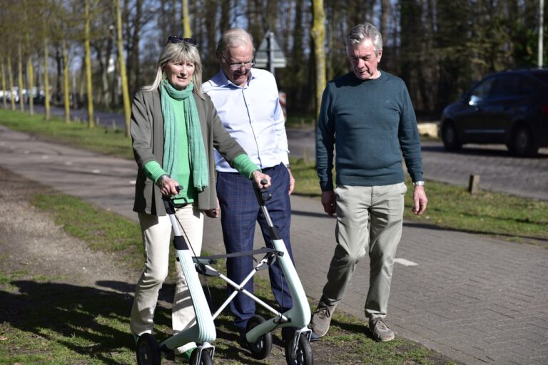 Quasar Quantum Healing Three people with a walker on a path