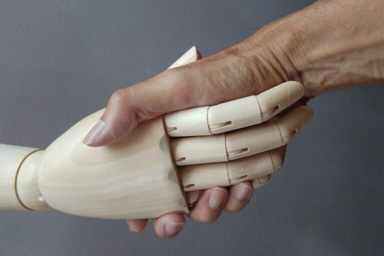 Reiki Healing a close up of a person holding a wooden object