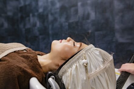 Salt Therapy a woman getting her hair brushed by a blow dryer