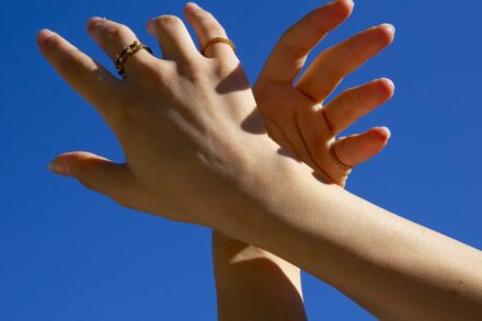 Energy-Based Healing a pair of hands with rings