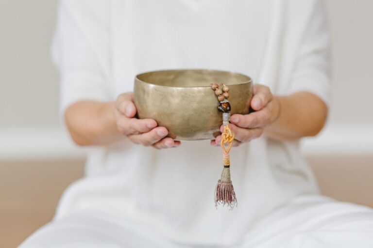 A person holding a bowl in their hands