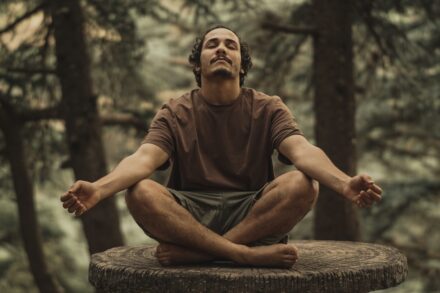 The Science Mindfulness Meditation Rewires Brain Well: Your Complete Guide to Lasting Mental Transformation 1 man in brown crew neck t-shirt sitting on brown wooden log