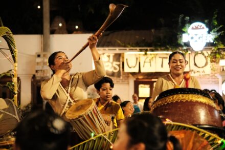 Traditional and Cultural Practices a group of people that are playing drums