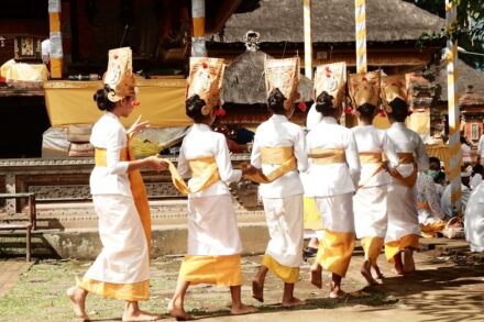 Traditional and Cultural Practices group of people in white uniform standing on green grass during daytime