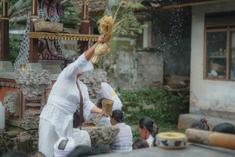 Traditional Healing Practices a group of people standing next to each other in front of a building