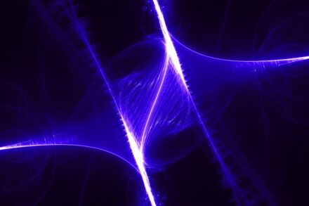 Abstract glowing purple energy lines on dark background