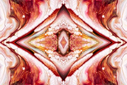 An abstract image of a red and white flower