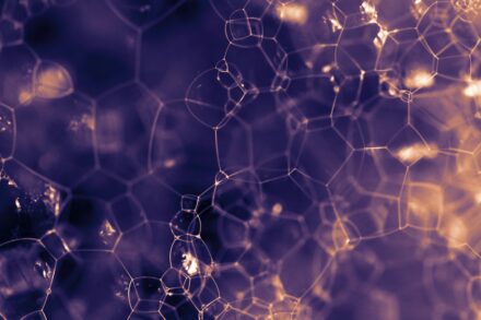 a close up of a cell phone with a blurry background