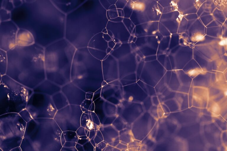 a close up of a cell phone with a blurry background